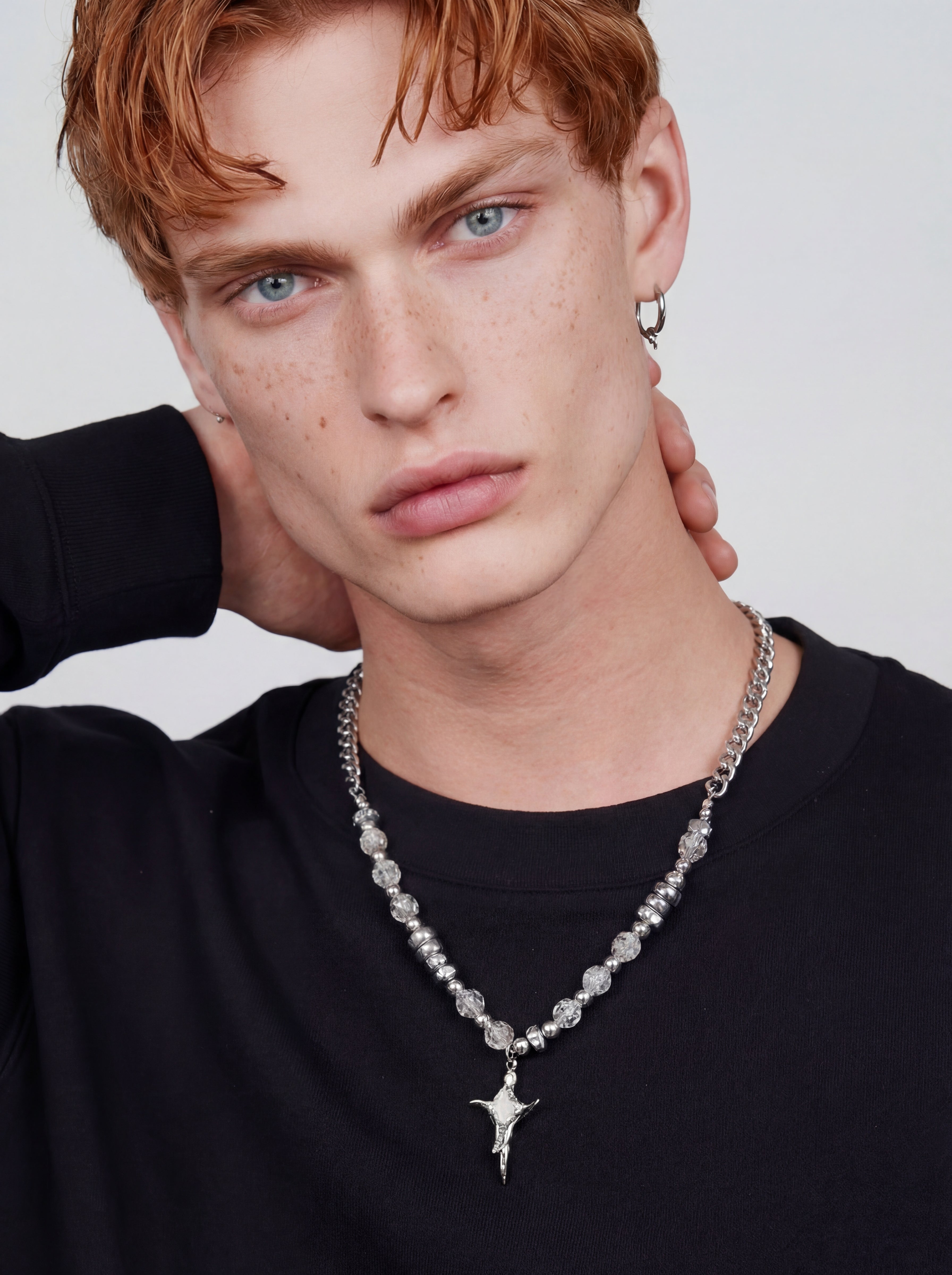 CAELUM men's silver necklace on white background
