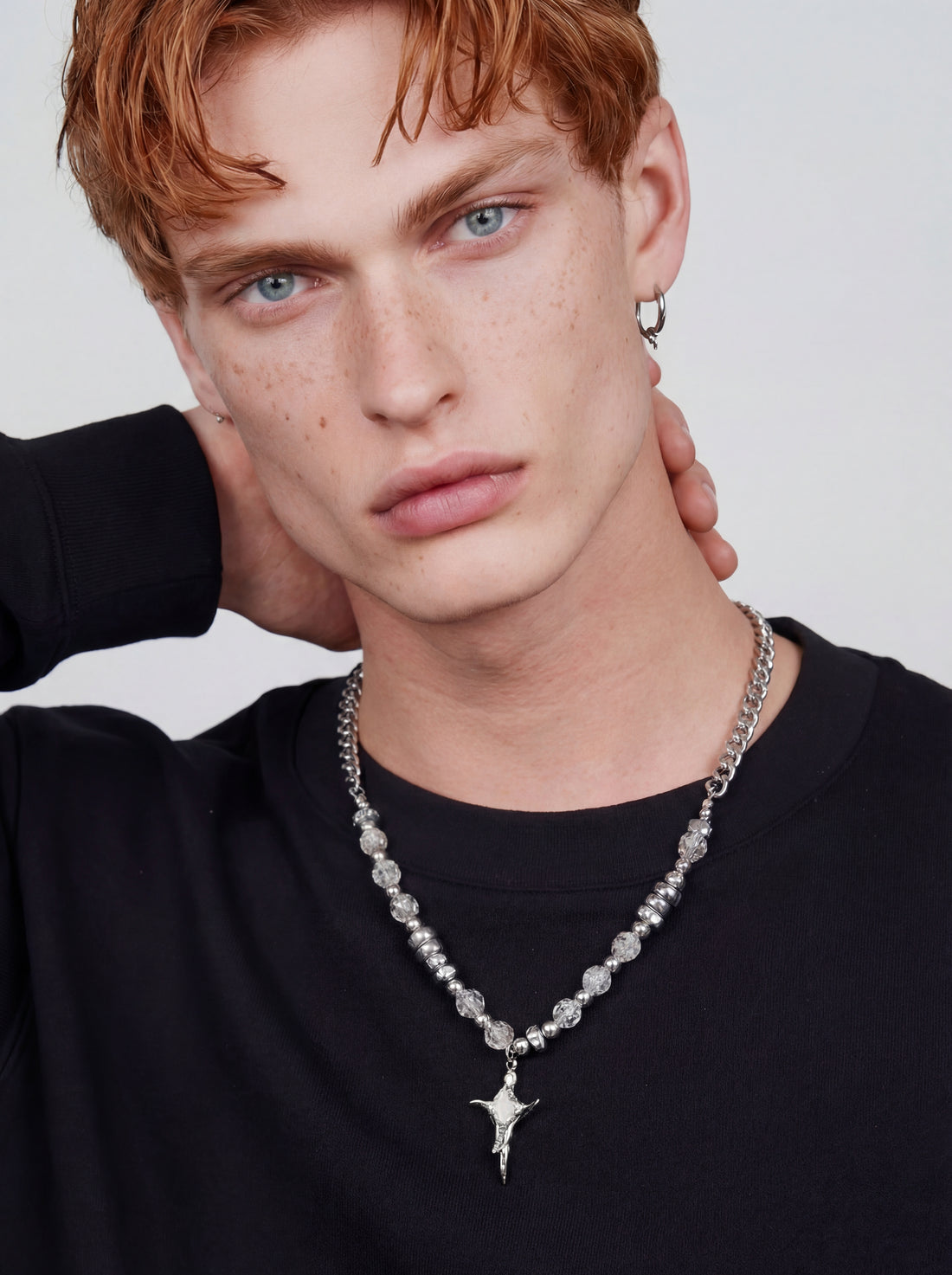 CAELUM men's silver necklace on white background