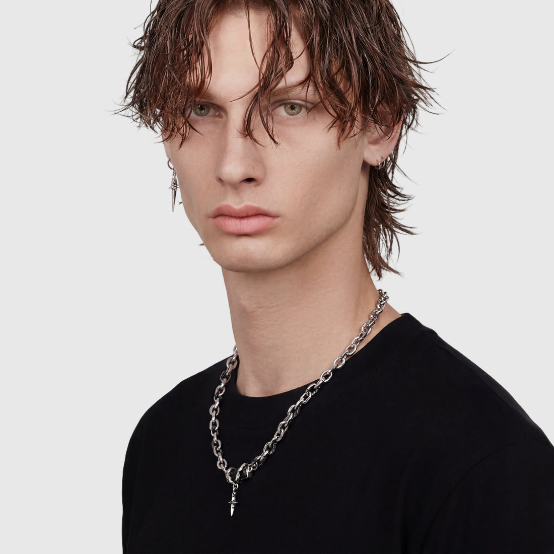 NYX men's silver necklace on white background