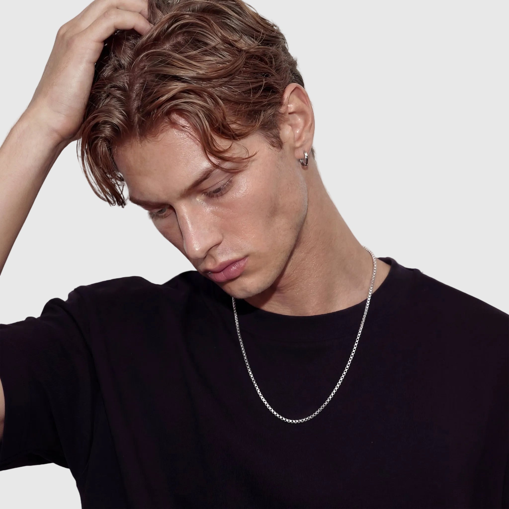 ROLAND men's silver necklace on white background