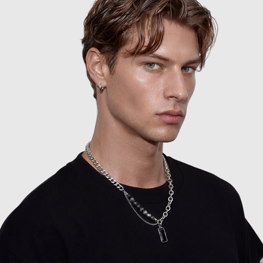SATURN men's silver necklace on white background